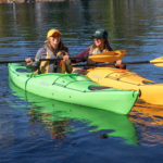 two girls kayaking
